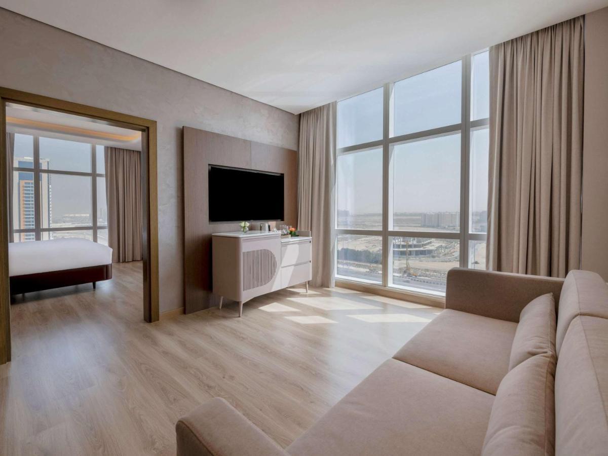 Movenpick Jumeirah Village Triangle Dubai Exterior foto Suite