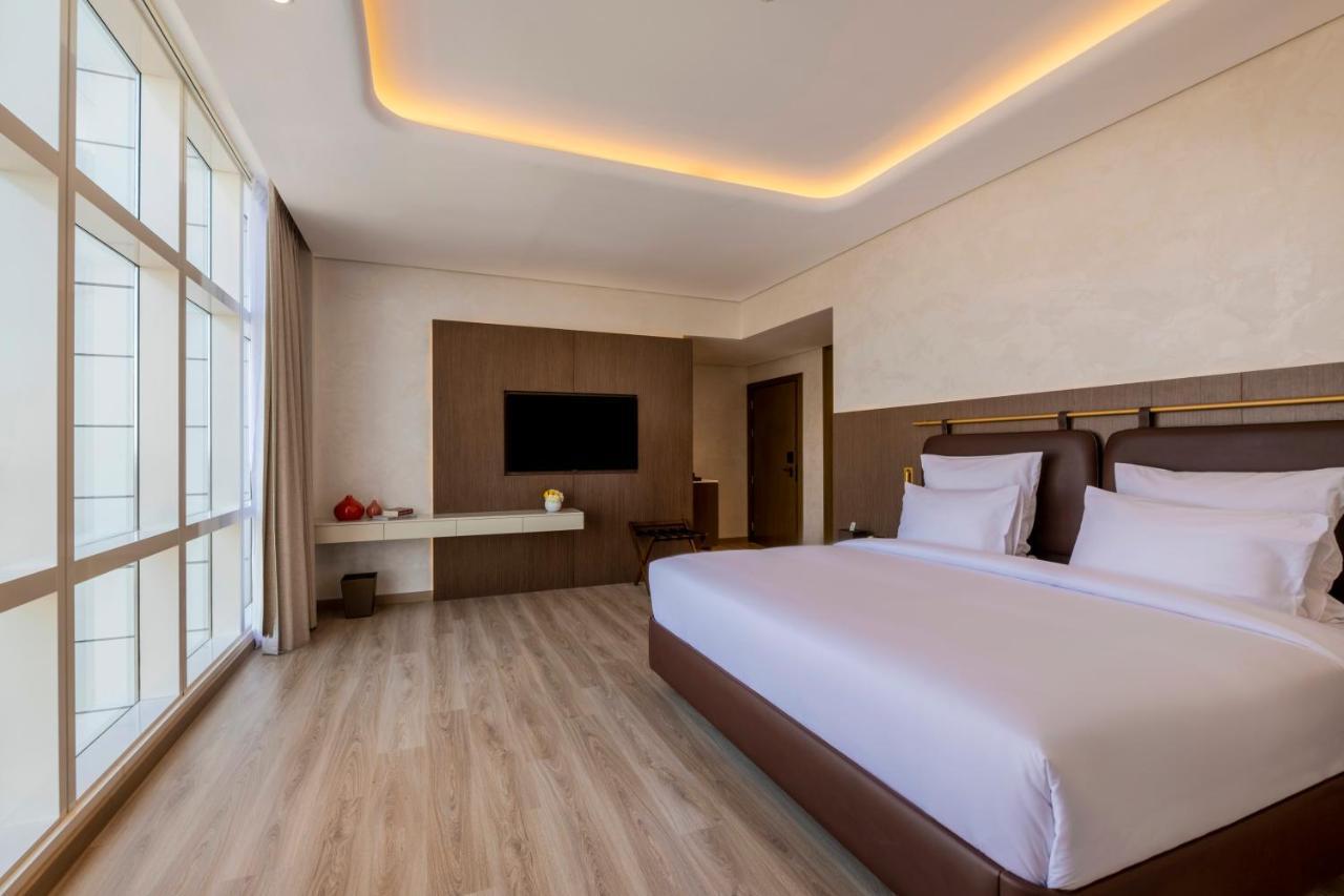 Movenpick Jumeirah Village Triangle Dubai Exterior foto