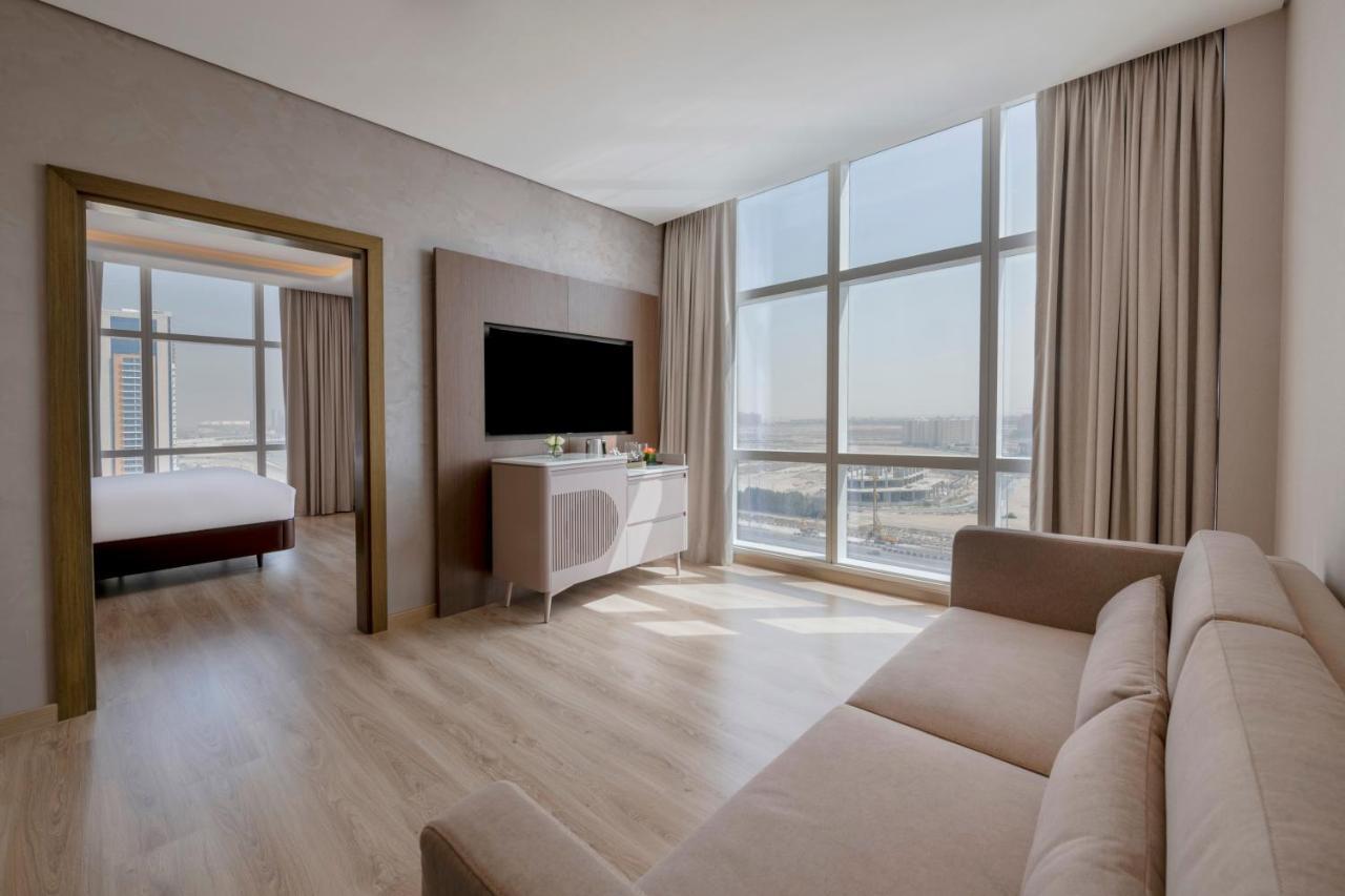 Movenpick Jumeirah Village Triangle Dubai Exterior foto Suite