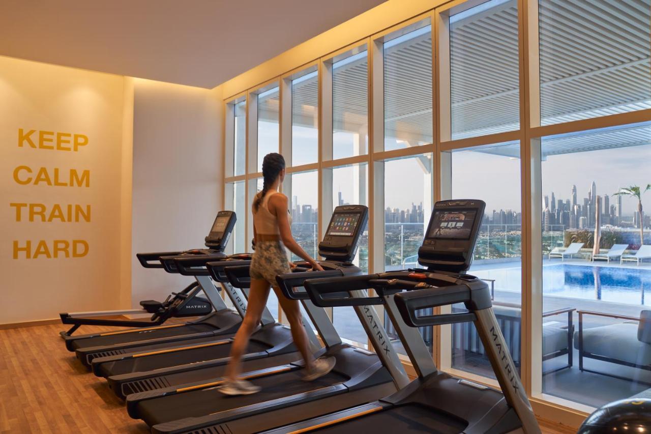 Movenpick Jumeirah Village Triangle Dubai Exterior foto The gym at the hotel