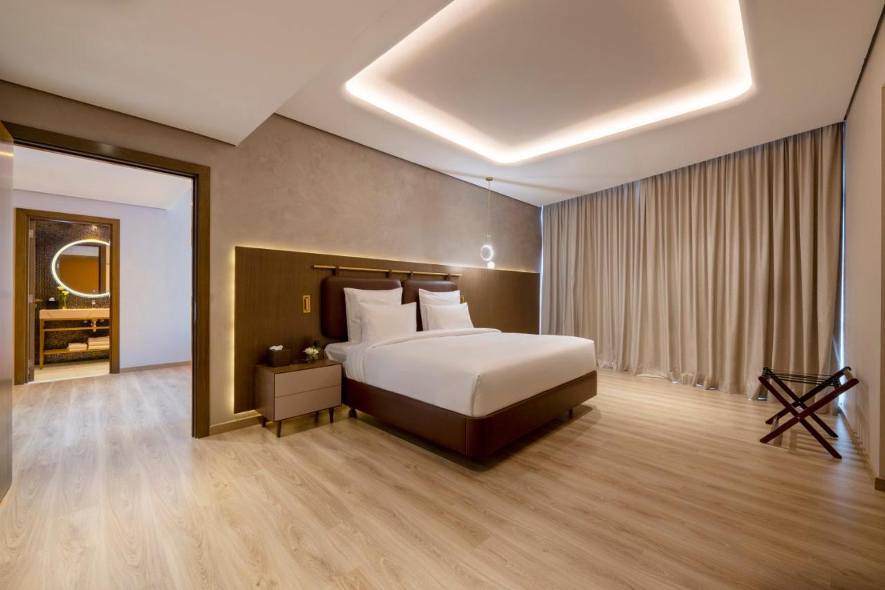 Movenpick Jumeirah Village Triangle Dubai Exterior foto Suite