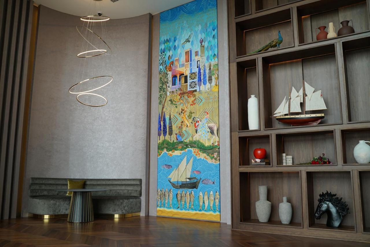 Movenpick Jumeirah Village Triangle Dubai Exterior foto The interior of the hotel