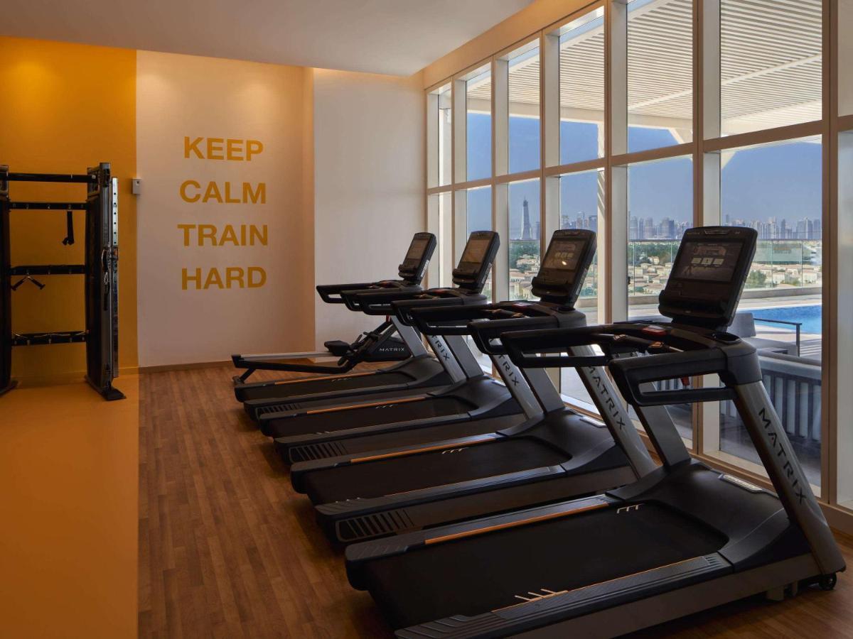 Movenpick Jumeirah Village Triangle Dubai Exterior foto The gym at the hotel