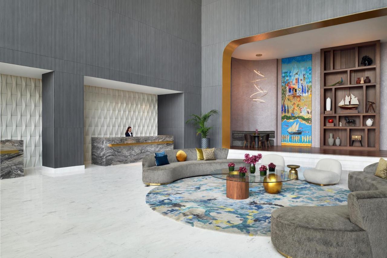 Movenpick Jumeirah Village Triangle Dubai Exterior foto The lobby of the hotel
